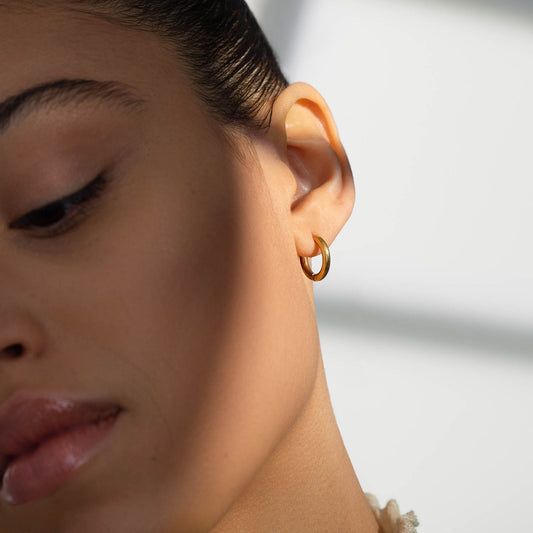 Gold Feather Hoop Earrings s1