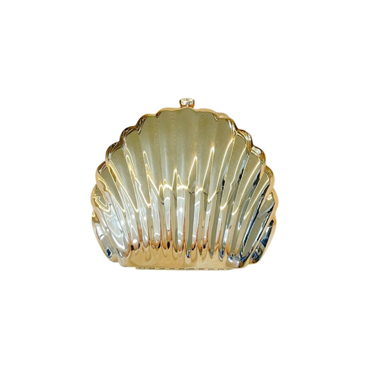Make waves. This shell-shaped clutch brings elegance with a twist.