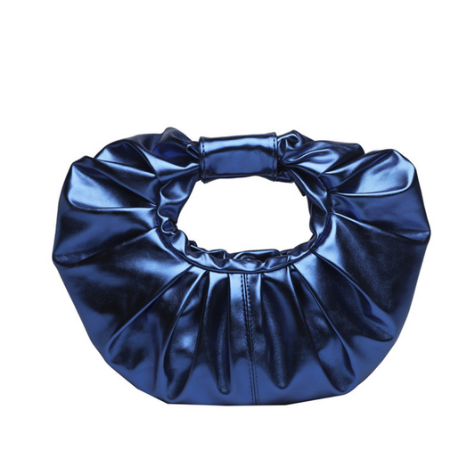 Soft shape. Scrunched handle. Major statement. This one’s made to move with you.