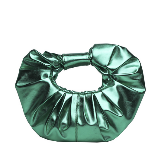 Soft shape. Scrunched handle. Major statement. This one’s made to move with you.