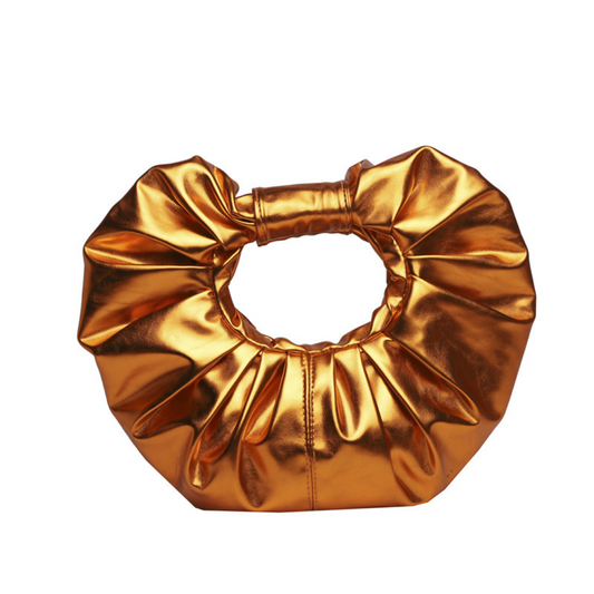 Soft shape. Scrunched handle. Major statement. This one’s made to move with you.