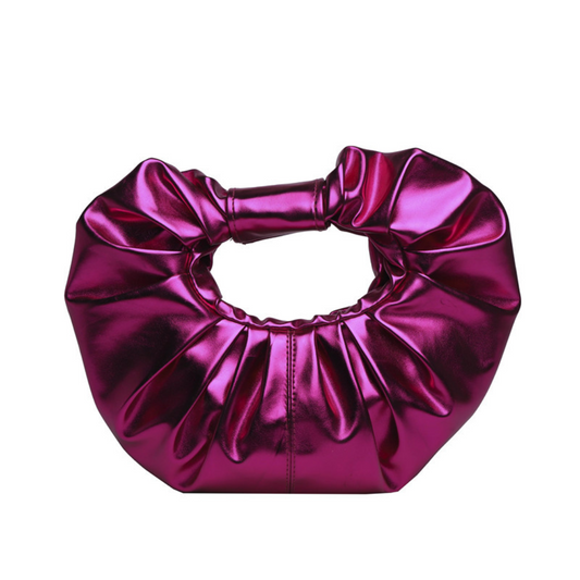 Soft shape. Scrunched handle. Major statement. This one’s made to move with you.